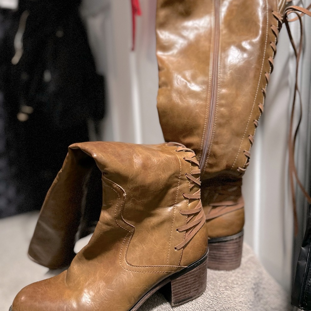 Brown, lace up the back , pleather tall boots. 10